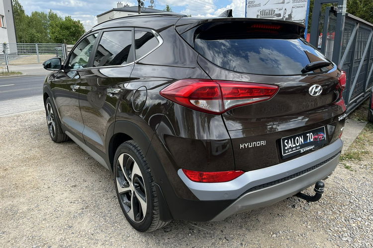 Hyundai Tucson 2.0 1WŁ Org Lakier 4x4 Automat Grzane Skóry Navi AluR19 Isofix StanBDB zdjęcie 11