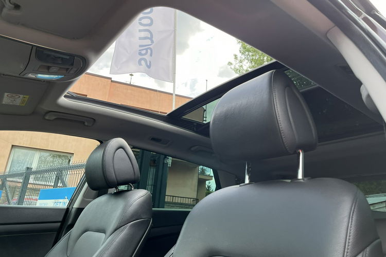 Hyundai Tucson 2.0 1WŁ Org Lakier 4x4 Automat Grzane Skóry Navi AluR19 Isofix StanBDB zdjęcie 14