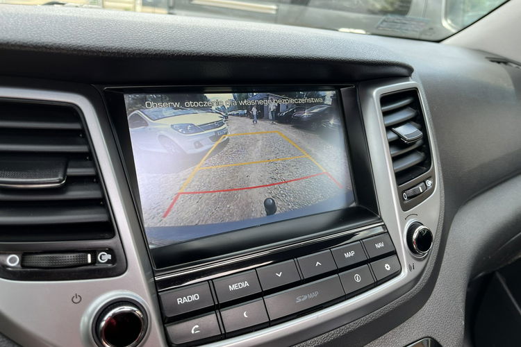 Hyundai Tucson 2.0 1WŁ Org Lakier 4x4 Automat Grzane Skóry Navi AluR19 Isofix StanBDB zdjęcie 18