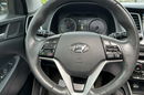 Hyundai Tucson 2.0 1WŁ Org Lakier 4x4 Automat Grzane Skóry Navi AluR19 Isofix StanBDB zdjęcie 19