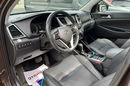 Hyundai Tucson 2.0 1WŁ Org Lakier 4x4 Automat Grzane Skóry Navi AluR19 Isofix StanBDB zdjęcie 23
