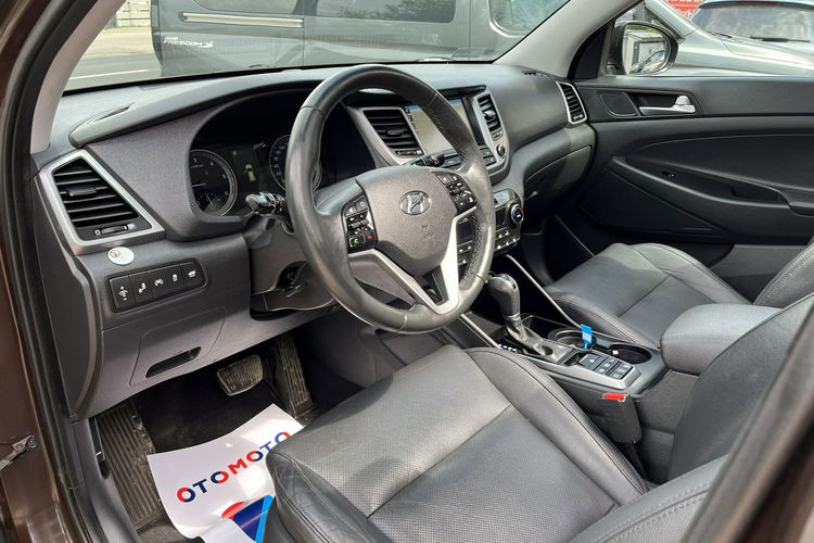Hyundai Tucson 2.0 1WŁ Org Lakier 4x4 Automat Grzane Skóry Navi AluR19 Isofix StanBDB zdjęcie 23