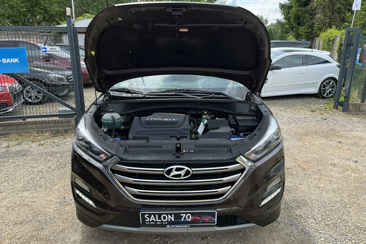 Hyundai Tucson 2.0 1WŁ Org Lakier 4x4 Automat Grzane Skóry Navi AluR19 Isofix StanBDB zdjęcie 38