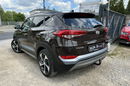 Hyundai Tucson 2.0 1WŁ Org Lakier 4x4 Automat Grzane Skóry Navi AluR19 Isofix StanBDB zdjęcie 4