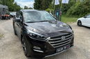 Hyundai Tucson 2.0 1WŁ Org Lakier 4x4 Automat Grzane Skóry Navi AluR19 Isofix StanBDB zdjęcie 8