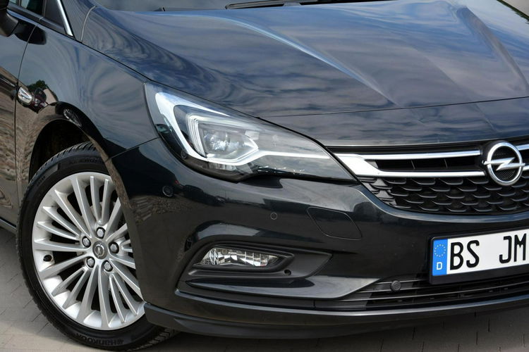 Opel Astra Bi-Xenon Ledy Skóry Navi Kamera Pół-skóry 2xParktr. Chromy zdjęcie 8