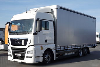 MAN TGX 26.470 / 6x2 / FIRANKA - 7.7 m / 60 m3 / PODNOSZONY DACH / oś podnoszona / 2021 ROK / ZŁOTY KONTRAKT SERWISOWY