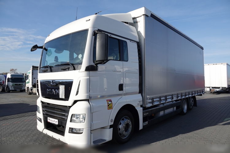 MAN TGX 26.470 / 6x2 / FIRANKA - 7.7 m / 60 m3 / PODNOSZONY DACH / oś podnoszona / 2021 ROK / ZŁOTY KONTRAKT SERWISOWY zdjęcie 2