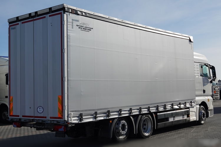 MAN TGX 26.470 / 6x2 / FIRANKA - 7.7 m / 60 m3 / PODNOSZONY DACH / oś podnoszona / 2021 ROK / ZŁOTY KONTRAKT SERWISOWY zdjęcie 6