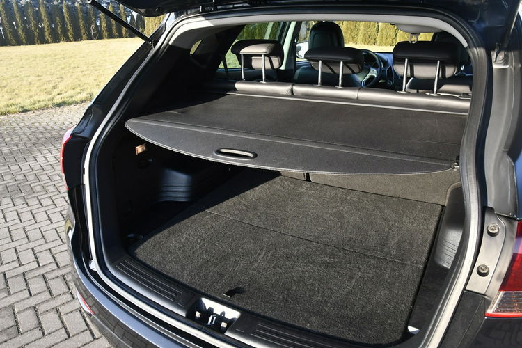 Hyundai ix35 2.0d 4X4 AWD Panorama Dach.Klimatr 2 str. Skóry.Navi.Kam.Cofania.OKAZJ zdjęcie 21
