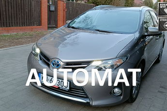 Toyota Auris Touring Sports 1.8 Hybrid Lounge, automat, I rej.30.12.2014 , bezwyp.