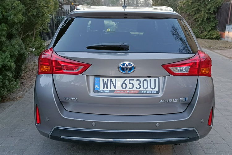 Toyota Auris Touring Sports 1.8 Hybrid Lounge, automat, I rej.30.12.2014 , bezwyp. zdjęcie 4