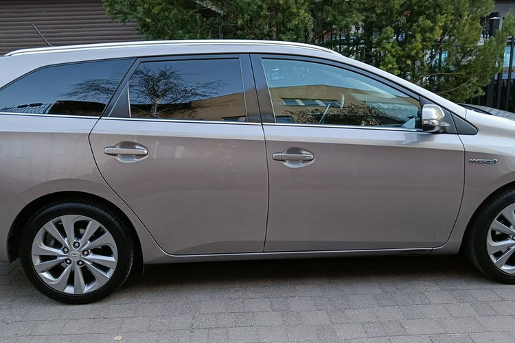 Toyota Auris Touring Sports 1.8 Hybrid Lounge, automat, I rej.30.12.2014 , bezwyp. zdjęcie 7