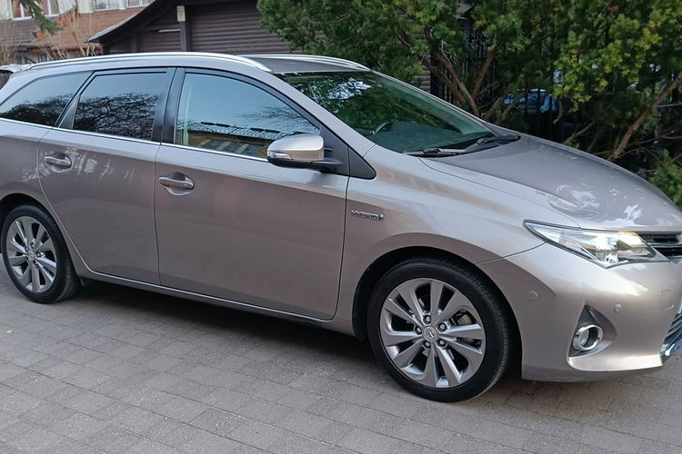 Toyota Auris Touring Sports 1.8 Hybrid Lounge, automat, I rej.30.12.2014 , bezwyp. zdjęcie 8