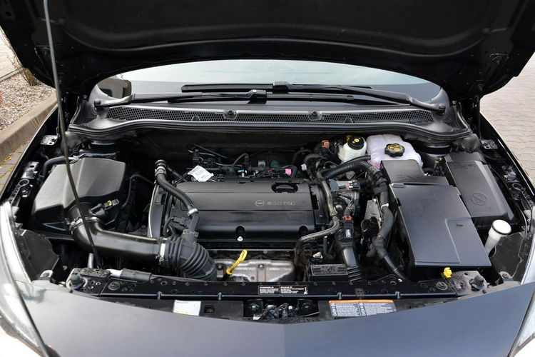 Opel Astra Skóry Duża Navi bi-xenon Szyber Ledy 2xParktr.Chrom Cosmo Alu 18" zdjęcie 38