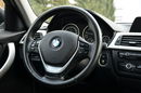 BMW 320 Czarna Zarejestrowana Serwisowana Bi-xenon Navi Start/Stop zdjęcie 29
