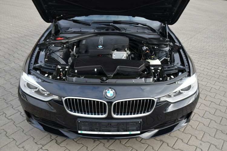 BMW 320 Czarna Zarejestrowana Serwisowana Bi-xenon Navi Start/Stop zdjęcie 4