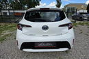 Toyota Corolla 1.8 HSD Ast. Pasa Distronic kamera Navi Grzane fotele Serwis zdjęcie 6