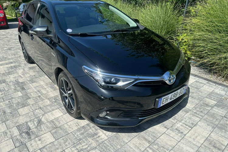 Toyota Auris Hybryda niski przebieg oryginalny lakier zdjęcie 26