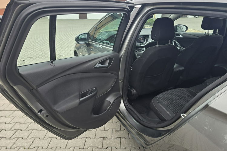 Opel Astra 1.4Turbo Benz. Navi.Kam.Cof.Asystent Pasa Ruchu.Ledy.Szyberdach. zdjęcie 21