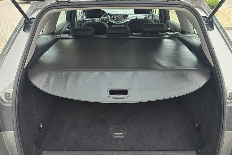 Opel Astra 1.4Turbo Benz. Navi.Kam.Cof.Asystent Pasa Ruchu.Ledy.Szyberdach. zdjęcie 24