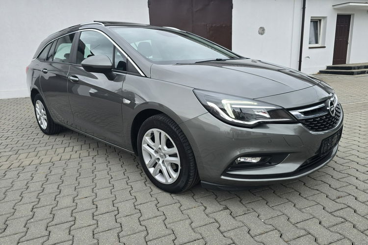 Opel Astra 1.4Turbo Benz. Navi.Kam.Cof.Asystent Pasa Ruchu.Ledy.Szyberdach. zdjęcie 3