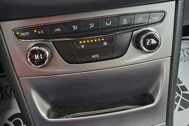 Opel Astra 1.4Turbo Benz. Navi.Kam.Cof.Asystent Pasa Ruchu.Ledy.Szyberdach. zdjęcie 35