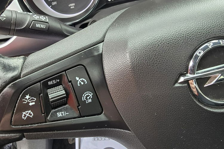 Opel Astra 1.4Turbo Benz. Navi.Kam.Cof.Asystent Pasa Ruchu.Ledy.Szyberdach. zdjęcie 36
