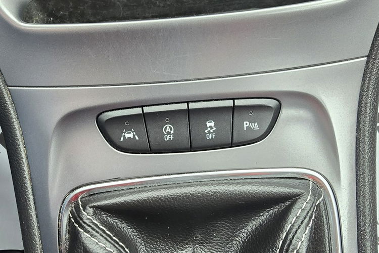 Opel Astra 1.4Turbo Benz. Navi.Kam.Cof.Asystent Pasa Ruchu.Ledy.Szyberdach. zdjęcie 37