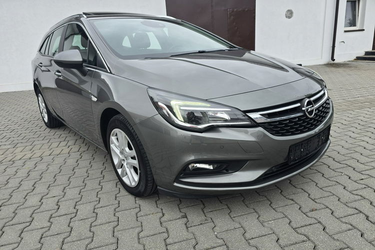 Opel Astra 1.4Turbo Benz. Navi.Kam.Cof.Asystent Pasa Ruchu.Ledy.Szyberdach. zdjęcie 6