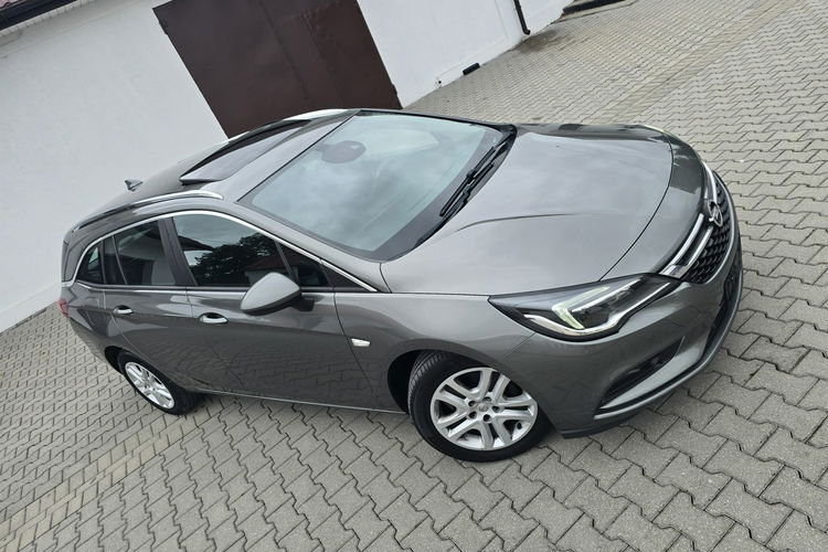 Opel Astra 1.4Turbo Benz. Navi.Kam.Cof.Asystent Pasa Ruchu.Ledy.Szyberdach. zdjęcie 7