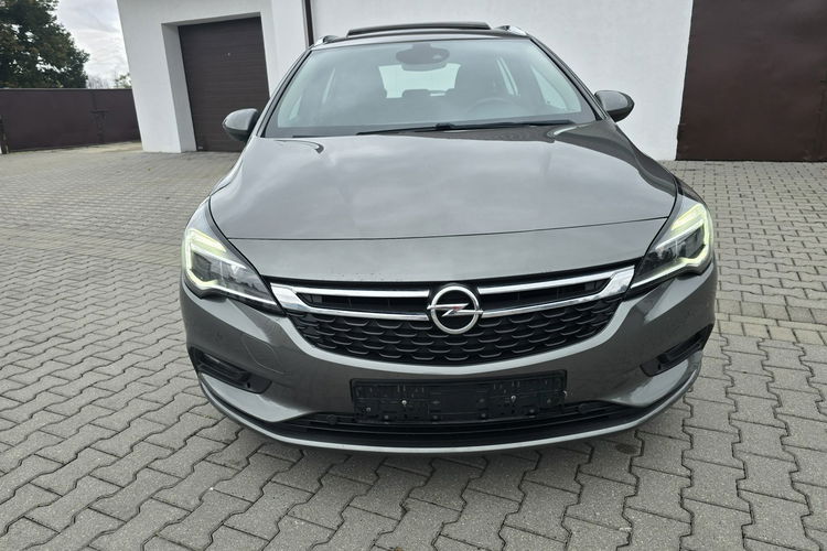 Opel Astra 1.4Turbo Benz. Navi.Kam.Cof.Asystent Pasa Ruchu.Ledy.Szyberdach. zdjęcie 8