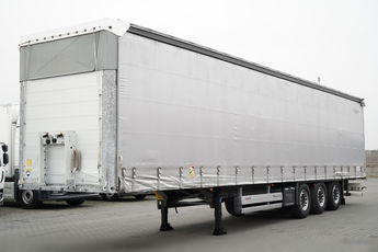 Schmitz -CARGOBULL / FIRANKA / STANDARD  / DACH PODNOSZONY / OŚ PODNOSZONA /