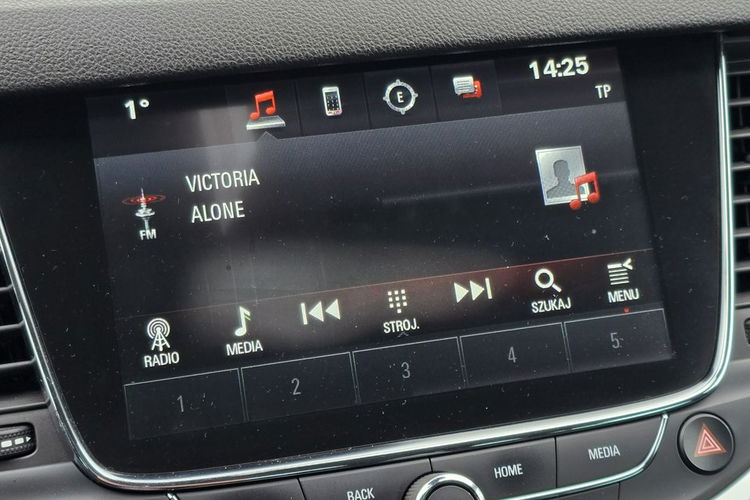 Opel Astra 1,4Turbo Benz. Navi.Kam.Cofania.Xenony.Ledy.Asyst.Pasa Ruchu.Elektr.Kl zdjęcie 33