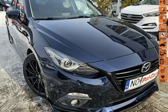 Mazda 3 Grzane fotele, dyfuzor, navi, kamera, wyświetlacz head-up, felgi 18 cali