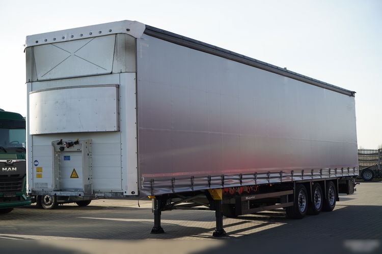 Schmitz -CARGOBULL / FIRANKA / JOLODA / TRAILERLODA /  VARIOS / 385/55 R22, 5 /  DACH PODNOSZONY  zdjęcie 1