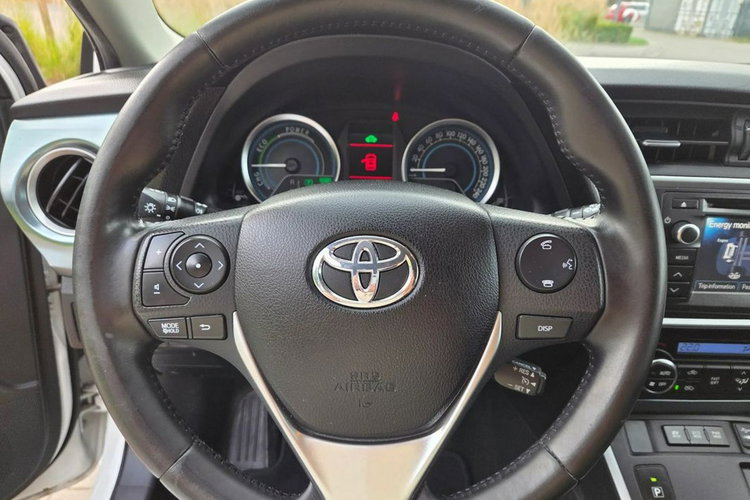 Toyota Auris 1.8 Benzyna Hybryda 136km Automat Biała Perła zdjęcie 24